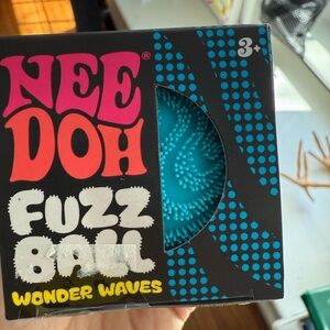 NIB blue Nee Doh Fuzz Ball Waves pattern